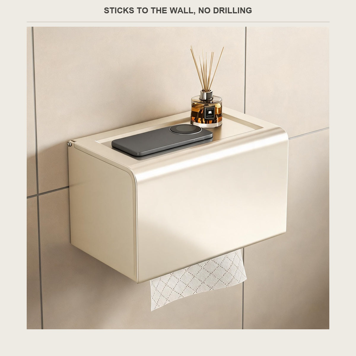 No-drill tissue box stuck to a bathroom wall with tissue hanging from the slot