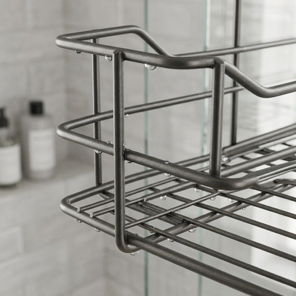 Gun-grey shower caddy in a tiled shower niche, renter friendly